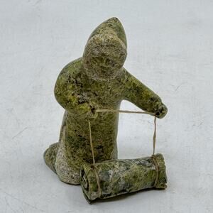Inuit Handmade Sculpture of Kneeling Woman with Bedroll by Arci Ishulutuq